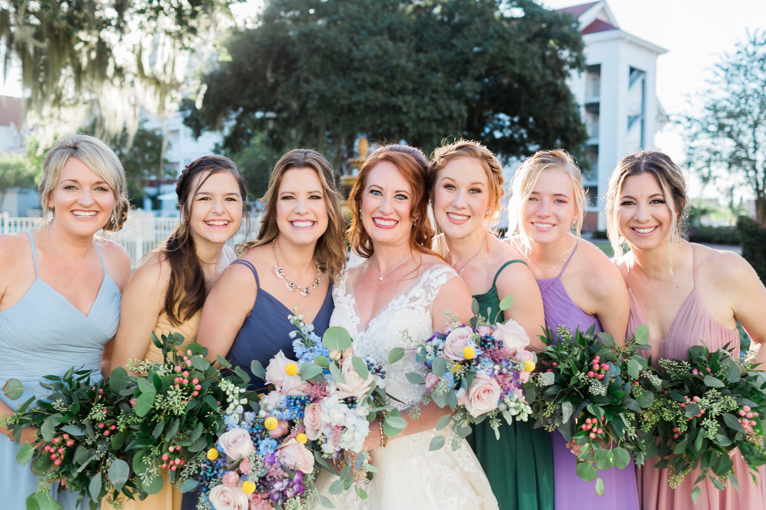 disney bridesmaids at grand floridian hugginh and smilling