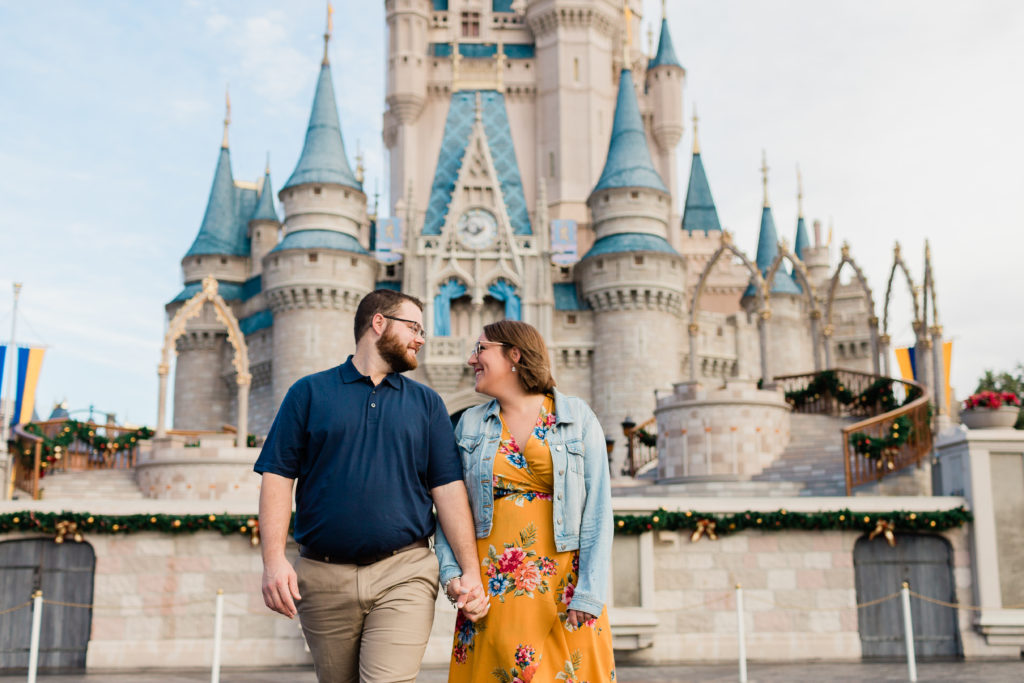 Main Street USA at Walt Disney World in Orlando Florida couple infront of Cinderella's Castle 
