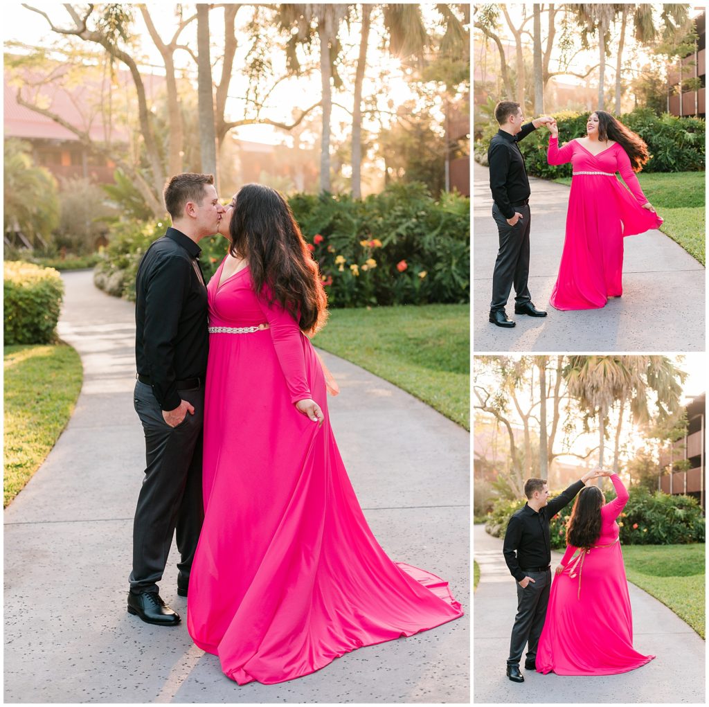 man twirling woman around in pink gown