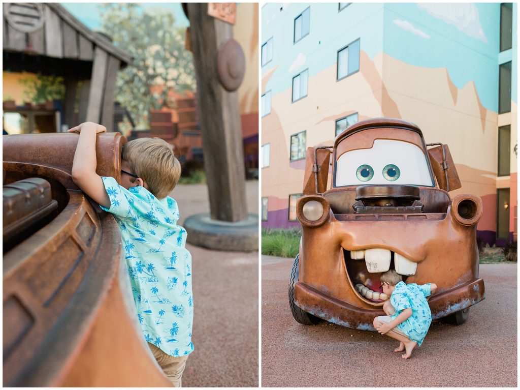 boy exploring the play car Tow Mater at Disney Resort