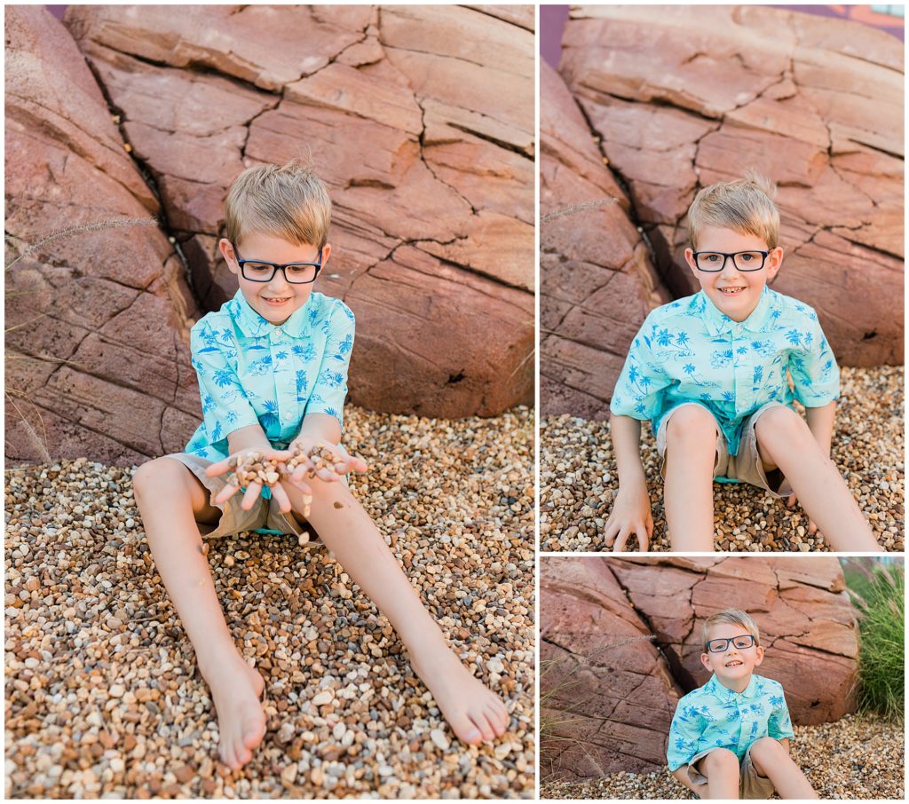 boy playing in rocks