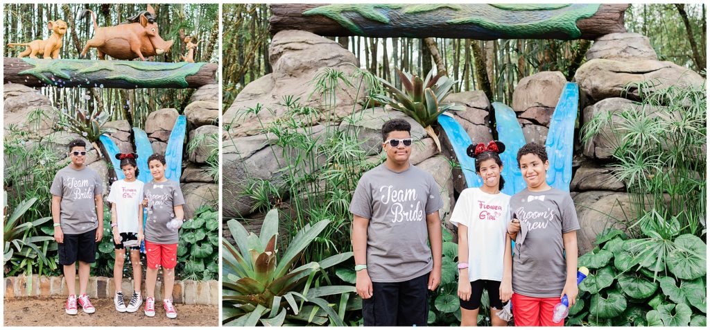 kids standing in front of Lion King statues in Animal Kingdom
