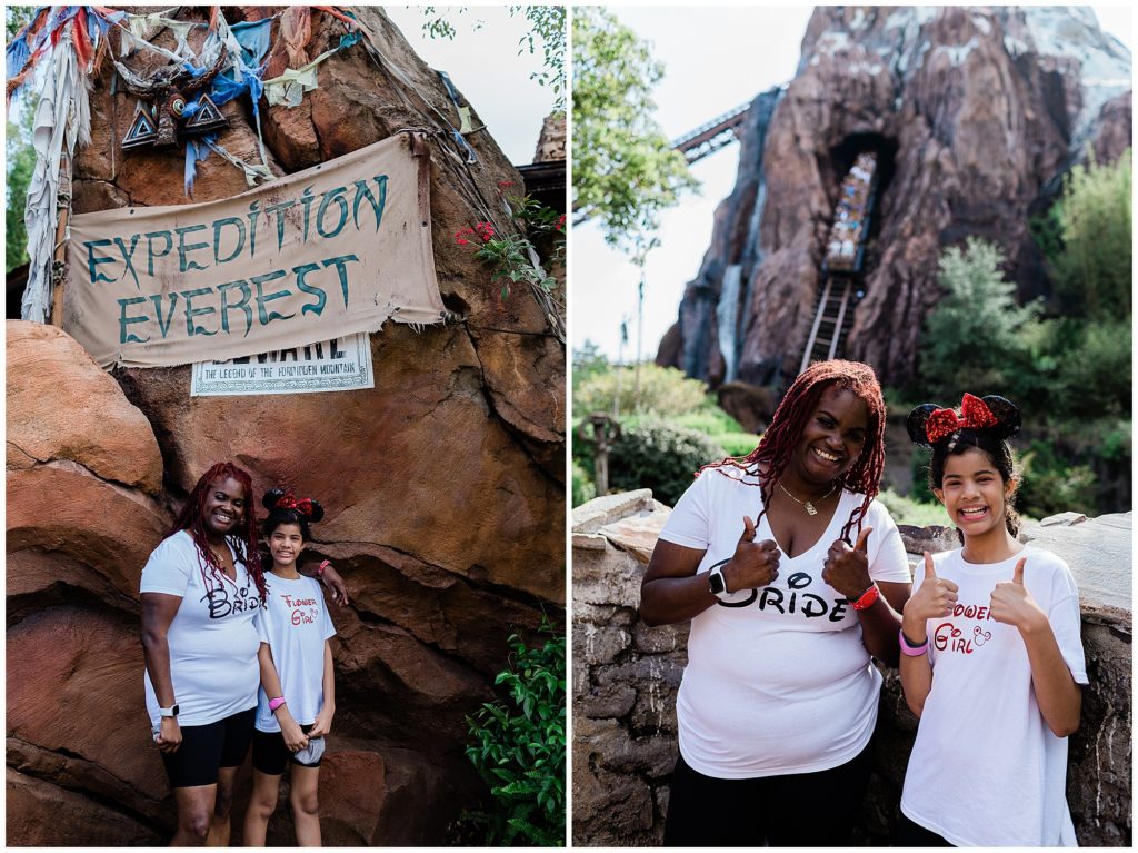 Expedition Everest in Animal Kingdom mother and daughter standing in front of sign and roller coaster