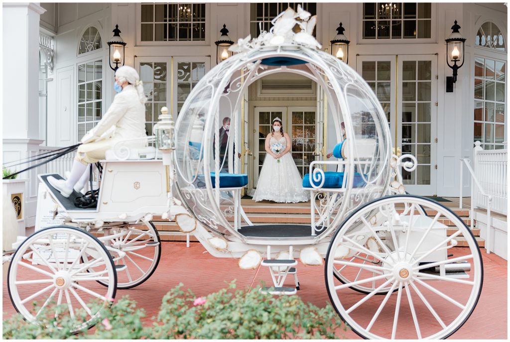 parents opening door for bride to walk to Cinderella's Coach