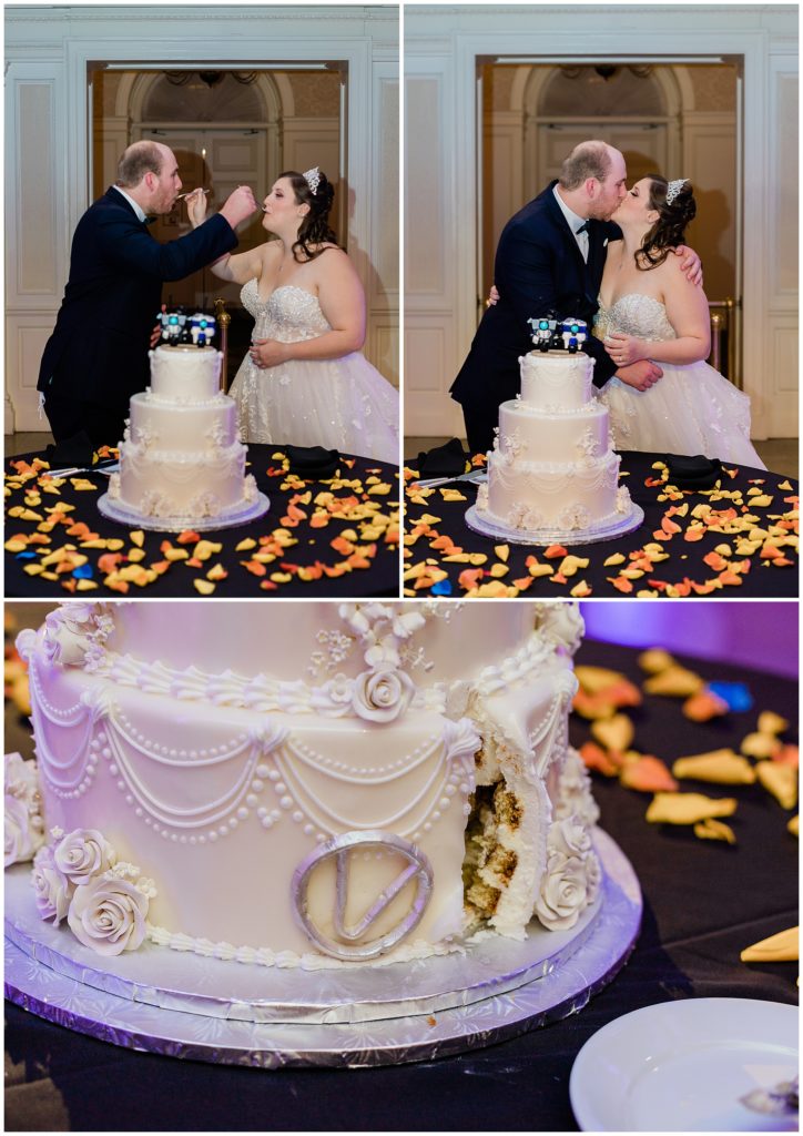 couple feeding each other wedding cake